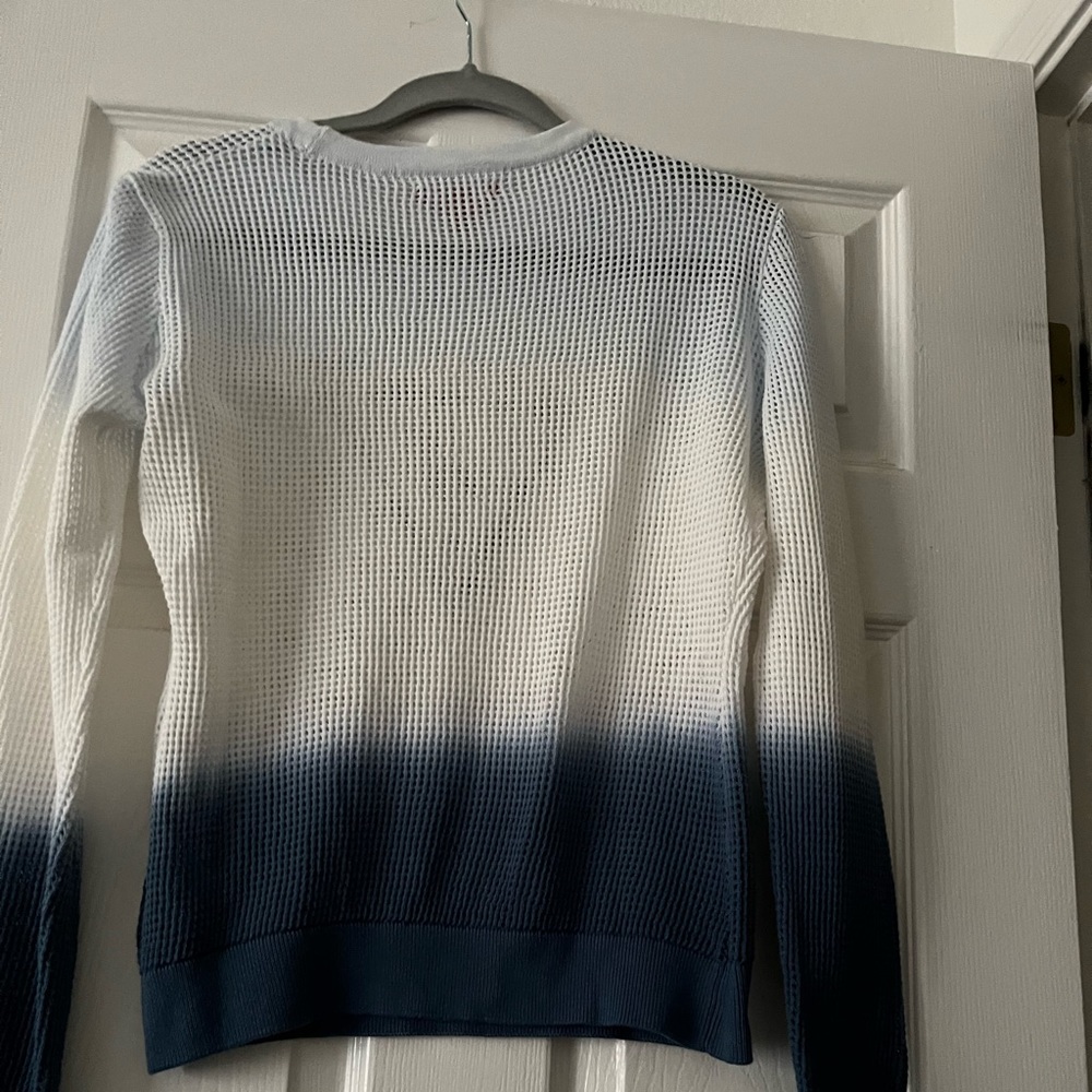 A brand-new guess is shirt size small never been worn